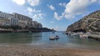 Xlendi Bay