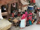 Puestos de fruta y verduras alrededor de Templo de Laxmi Narayan, Durbar Square